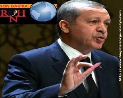 At gözlüğü ile bakan Gözler Erdoğan’ın Tahran ziyaretinde